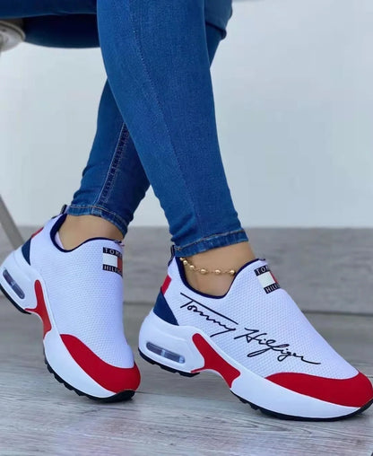 Women's slip-on sneakers with air cushion and mid heel in white, red, black, navy blue