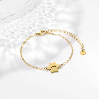 Stainless steel bracelet with a polished dog paw design, a stylish accessory for pet lovers
