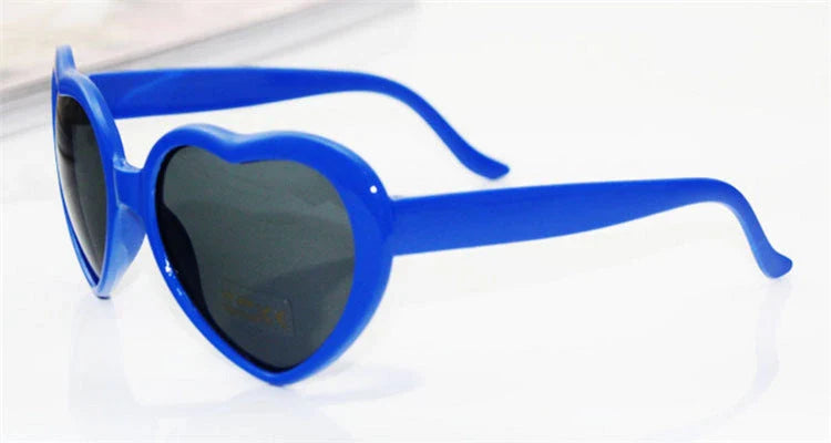 Fashionable heart-shaped light-up glasses with a built-in LED lighting system, perfect for adding a touch of love and playfulness to any occasion.