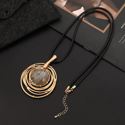 Gold geometric plaid pendant necklace on snakeskin wax rope chain with adjustable length