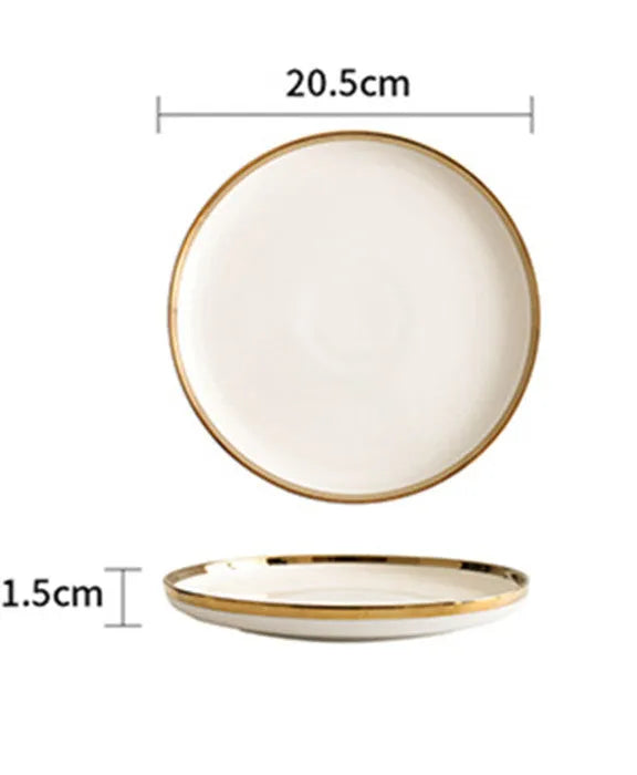 Platinum-coloured porcelain bowl and plate with gold rim, part of a wedding gift tableware set.