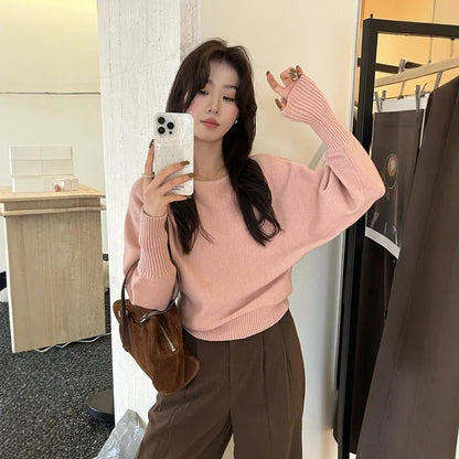 Women's long sleeve viscose pullover blouse in free size shown in one of seven colours.