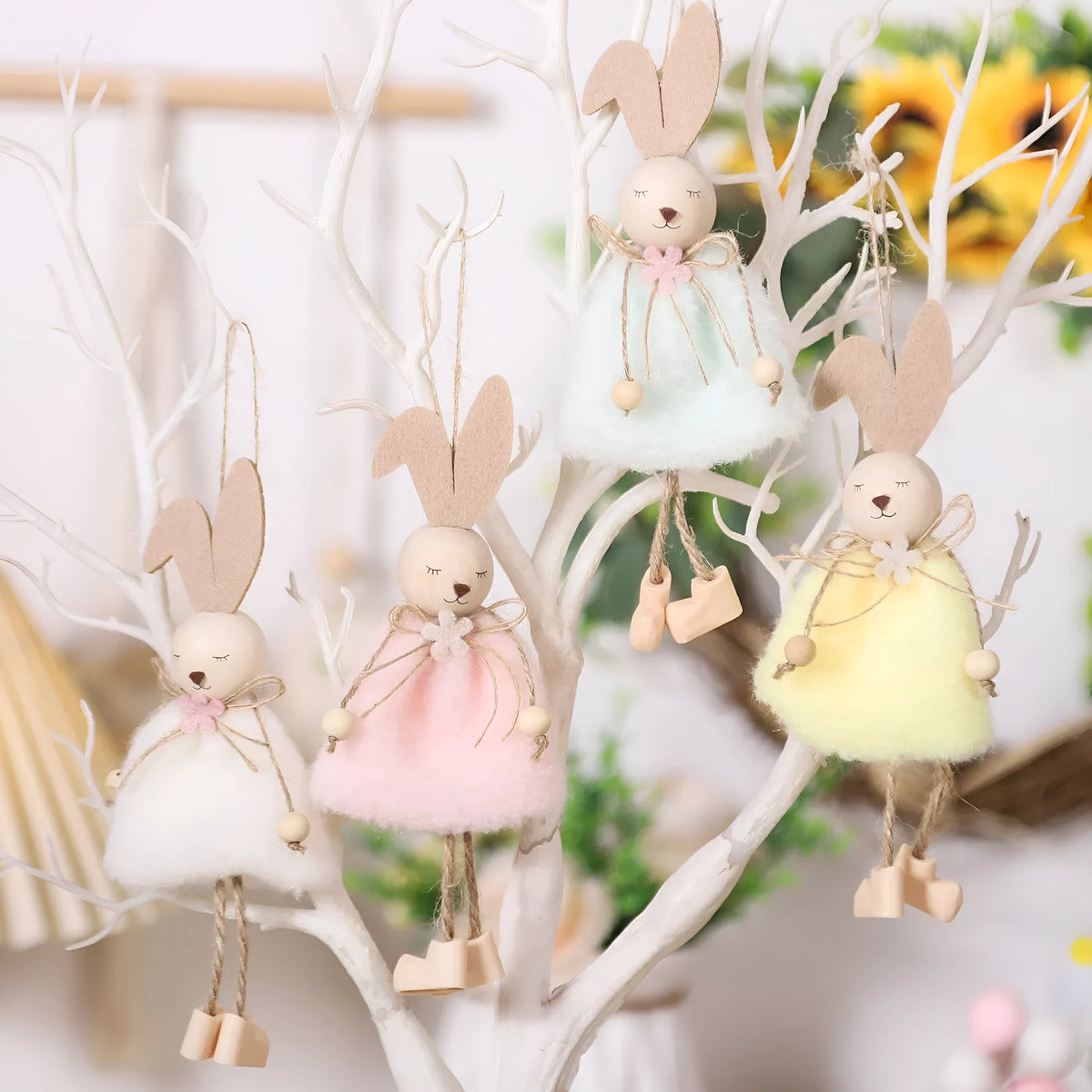 Cartoon rabbit cloth pendant Easter decoration hanging from a ribbon.