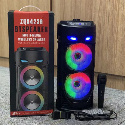 Black portable Bluetooth speaker with dual horn cannon design and wheat-coloured elements