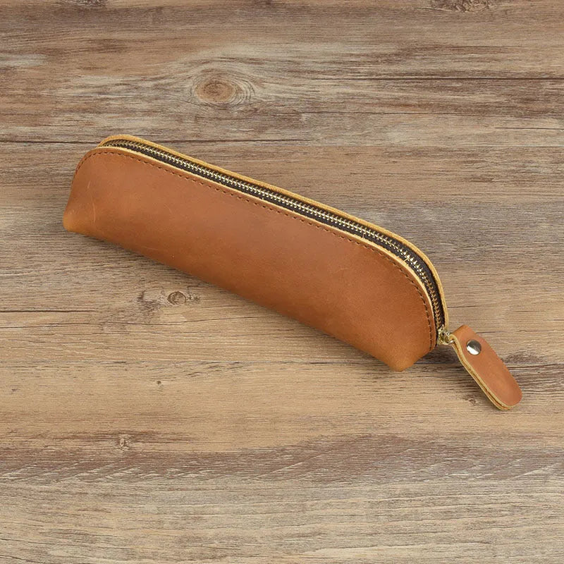 Square leather pencil case in genuine cowhide measuring 18cm with zipper closure