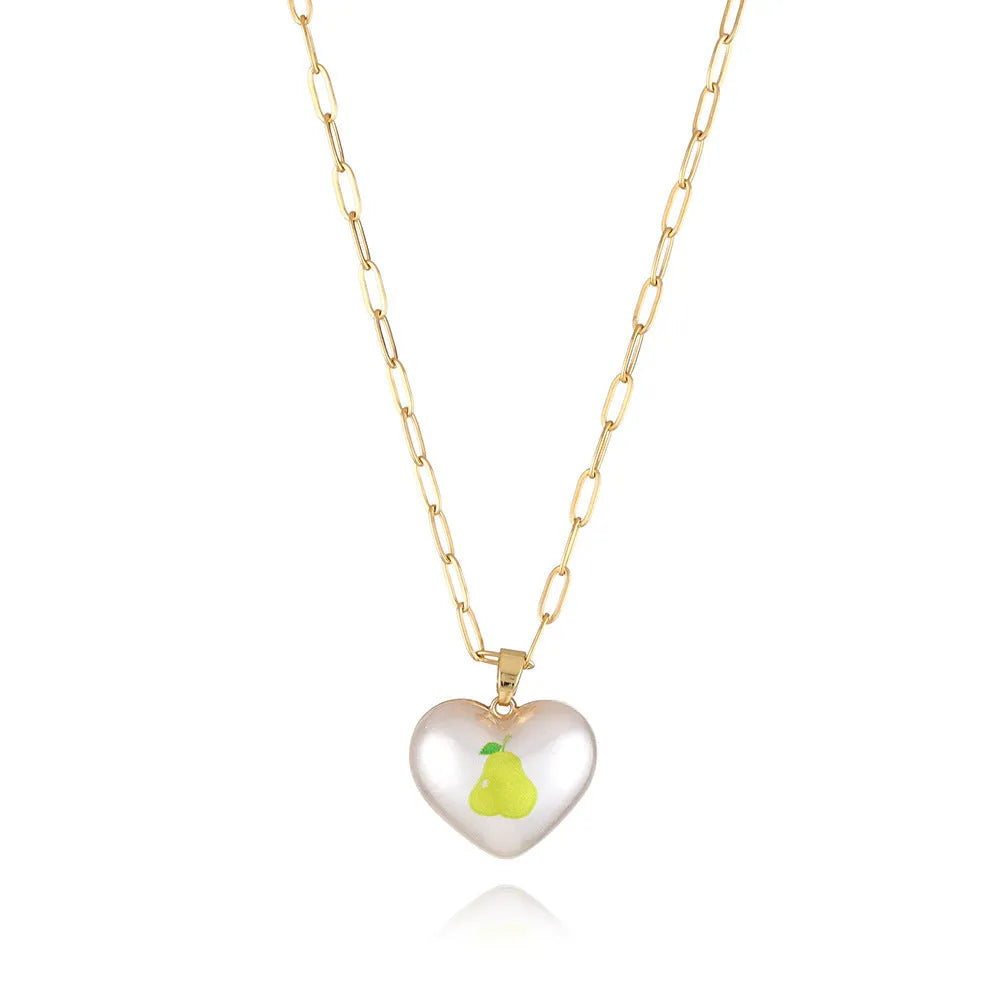 Geometric fruit heart pendant necklace on an adjustable chain, showing strawberry, pineapple, apple, pear, and cherry design options.