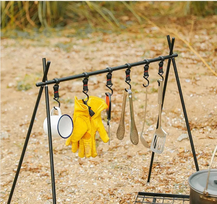 Aluminium alloy folding clothes drying rack with triangle frame and side hanger hooks for camping.