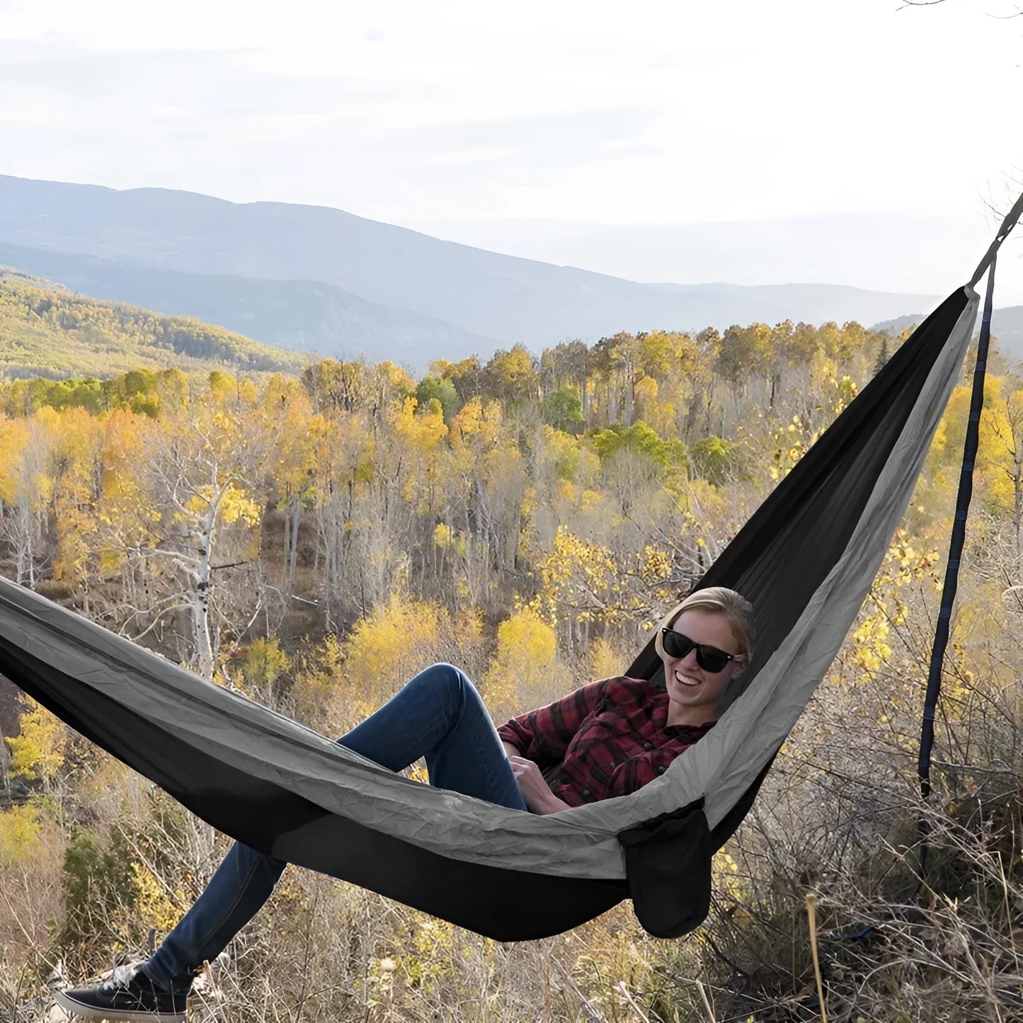 Double camping parachute hammock in colour options including black brown, black red, blue, and orange