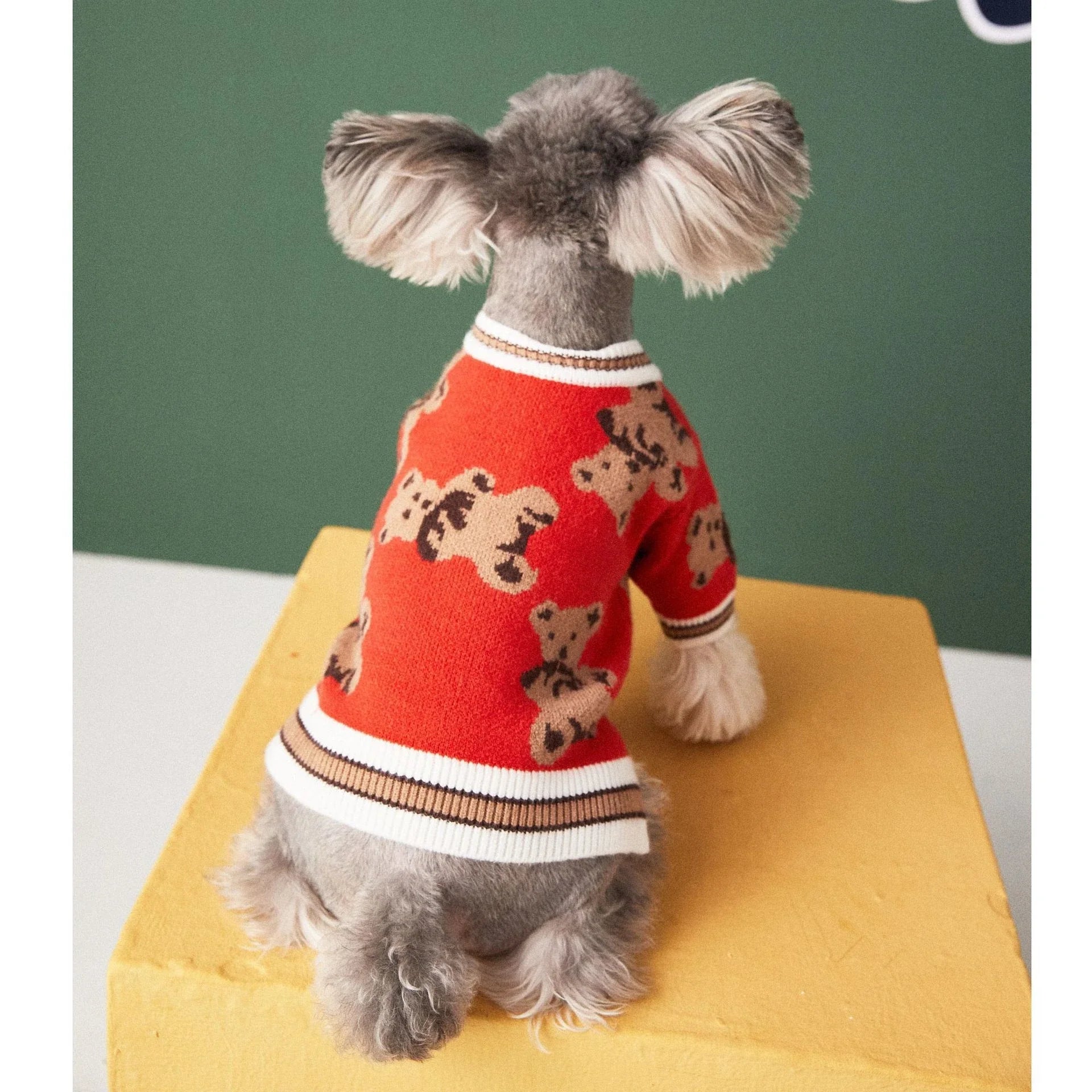 Cosy knitted pet jumper in classic British striped design, available in light blue, beige, and red colours