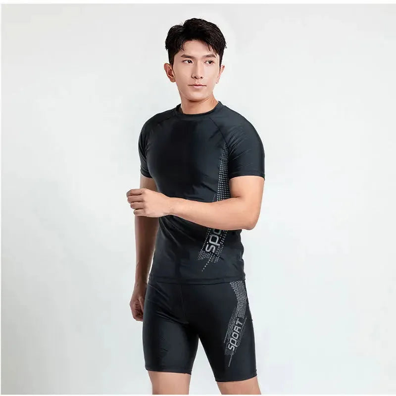 Men's plus size swimming trunks and top set in polyester fabric on a mannequin.