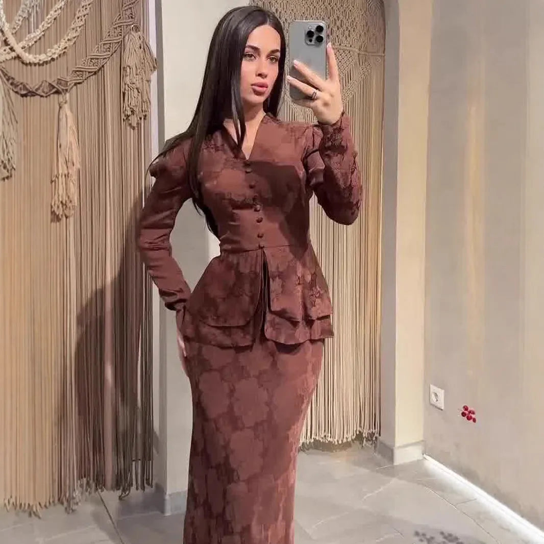 Dark brown long sleeve dress with plant and flower pattern, faux two-piece retro style.