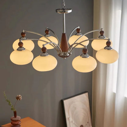 Persimmon glass chandelier with chrome frame in Middle Ancient style, shown with multiple glass shades.