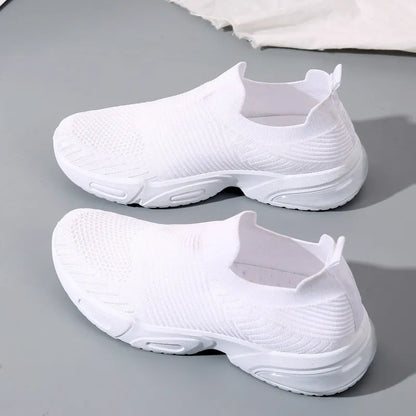 Slip-on breathable mesh sock shoes with a low-top design and PVC sole, shown in a neutral colour.