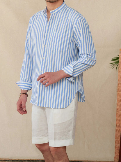 Blue and white seersucker striped long sleeve shirt with a loose lapel baseball collar.