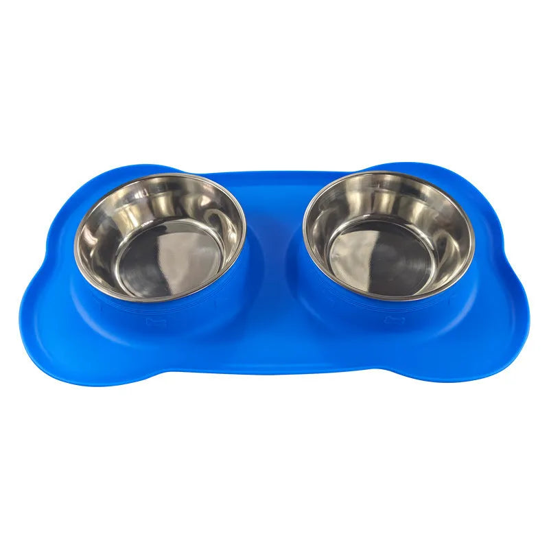 Large silicone dog bowl with stainless steel insert in five colour options on kitchen floor