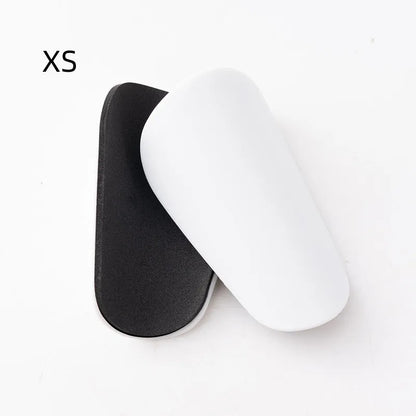 PU mini shin guards for football and running in black, white, red, and blue colours