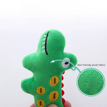 Plush cat toy in cow, crocodile, or parrot shape with colourful fabric and embroidered details.