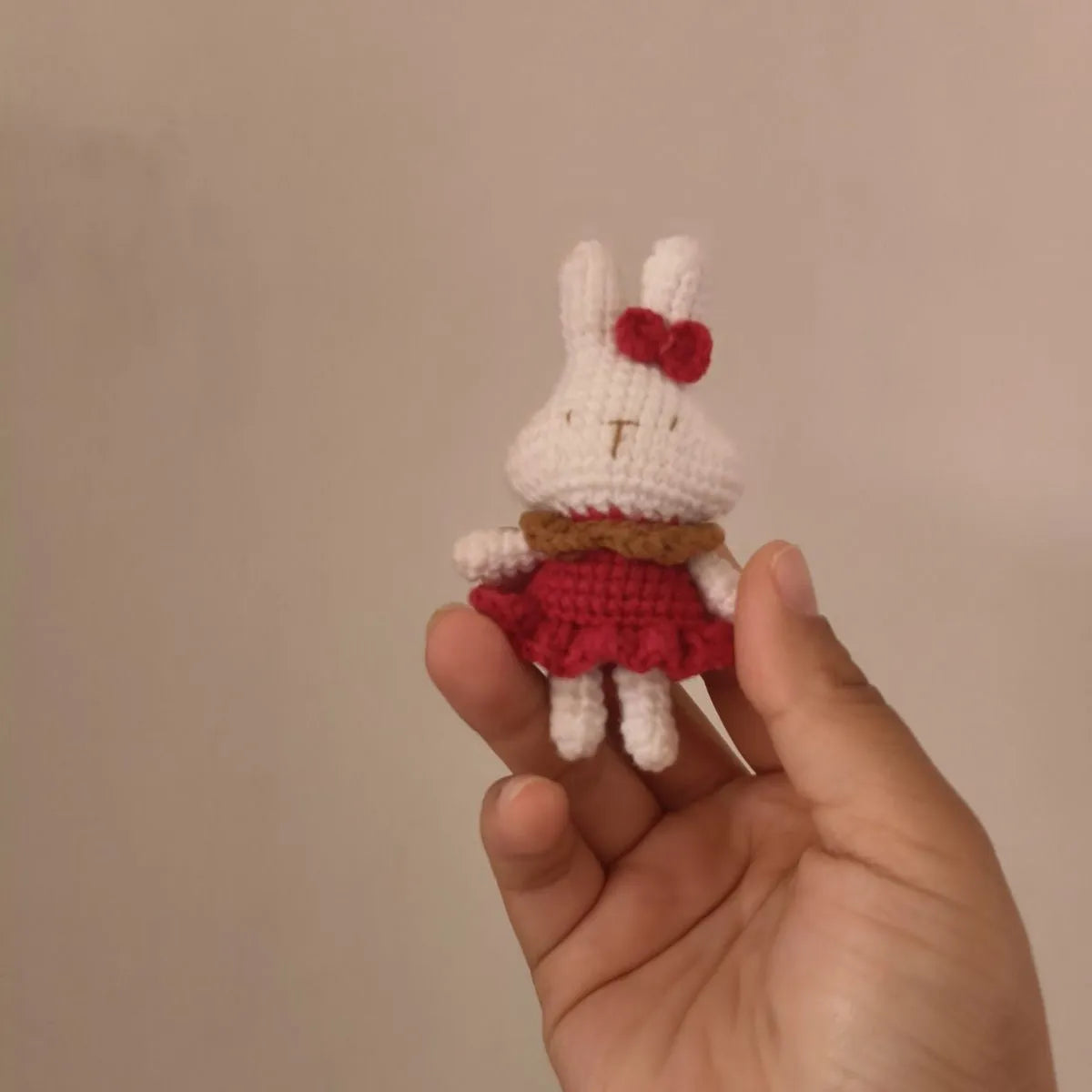 Hand-crocheted wool rabbit key chain charm with amigurumi design
