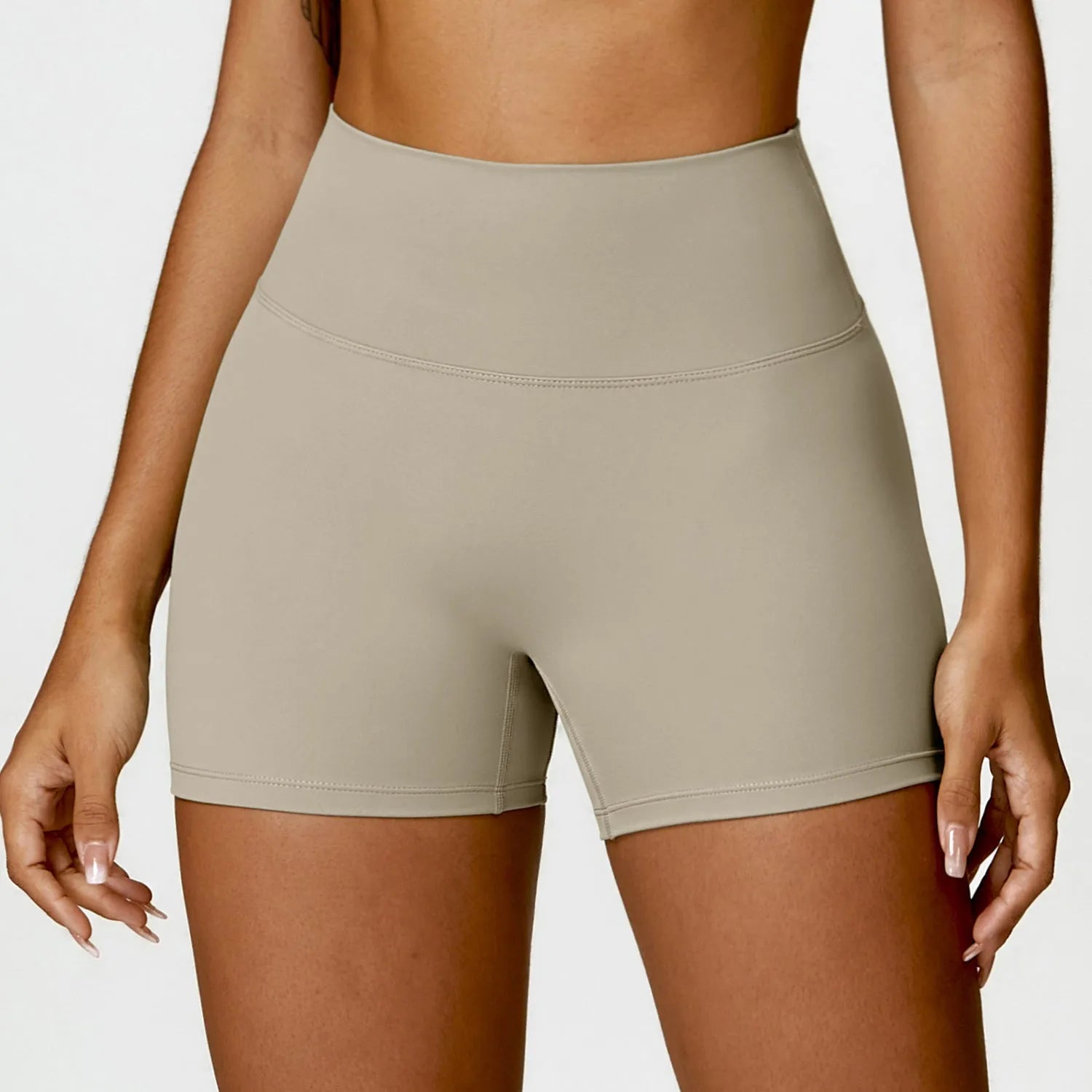 Women's high waist yoga shorts in nylon fabric with belly contracting design and hip lifting cut