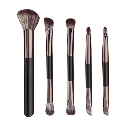 Portable makeup brush set with mirror showing artificial fibre brushes with silver handles