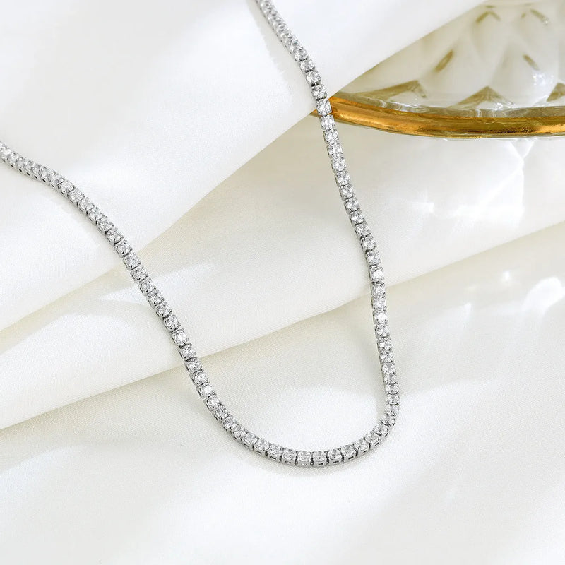 Women's sterling silver necklace featuring genuine 925 silver construction with round element diamond cut treatment design in classic silver colour for affordable luxury jewellery accessory