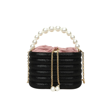Women's one-shoulder crossbody bag with pearl beading, round shape, and internal zipper pocket in black colour