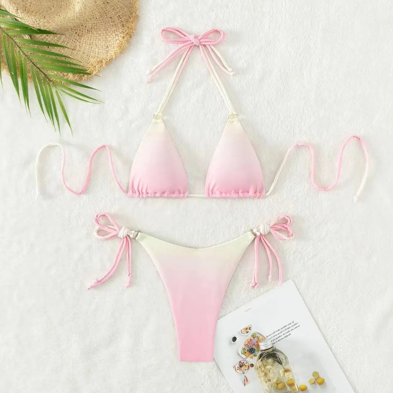 Women's gradient colour bikini swimwear set with separated top and bottom on a mannequin