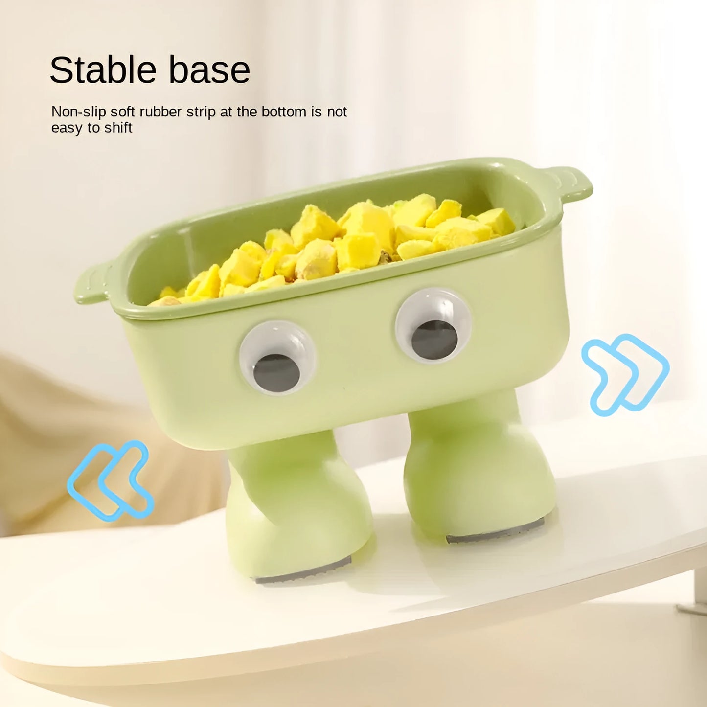 Robot-shaped elevated cat bowl with 15 degree tilt in green colour with detachable inner bowl