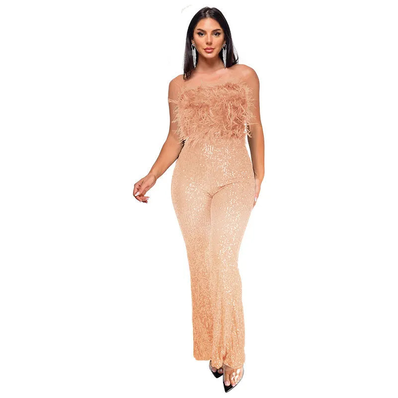Women's sleeveless backless jumpsuit with flared legs in a wine red colour.