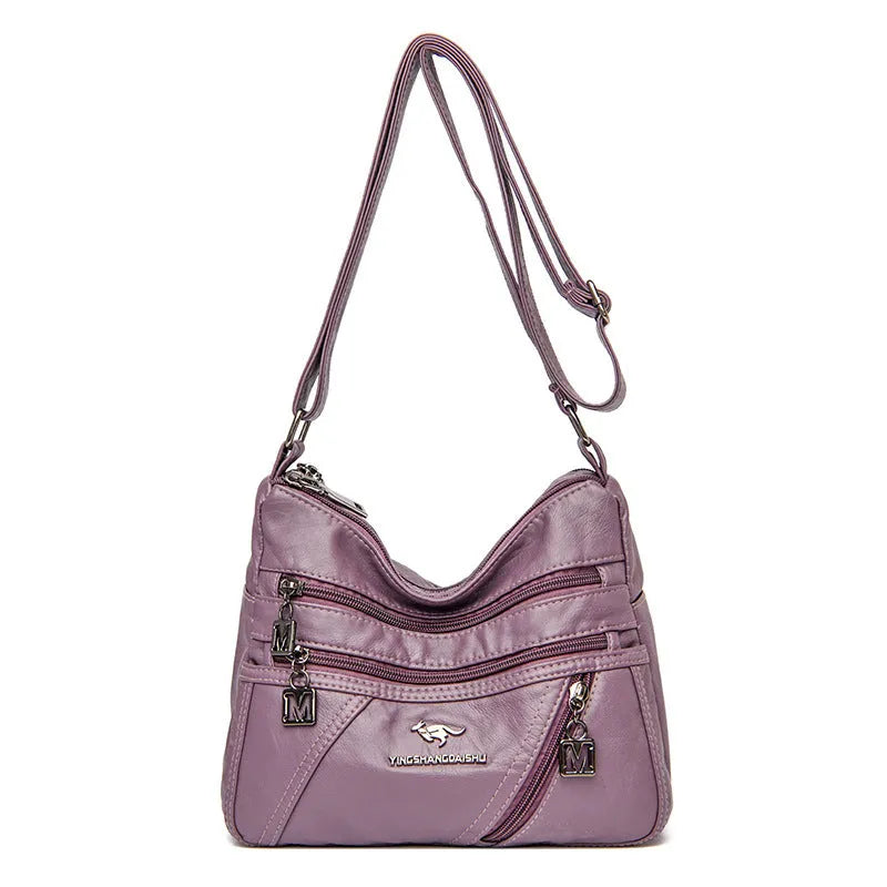 Middle-aged women's double layer PU shoulder bag with large capacity, welt pocket, and soft build in red, purple, dark blue, black, bronze, gray, or tan.