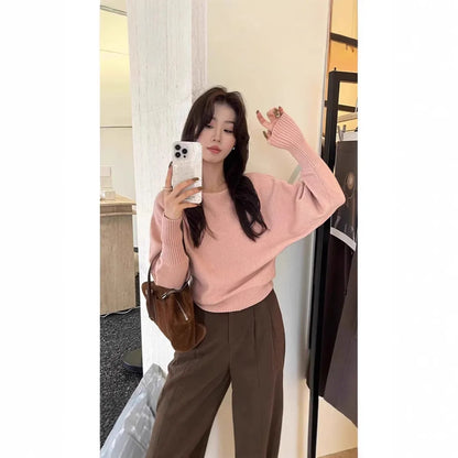 Women's long sleeve viscose pullover blouse in free size shown in one of seven colours.