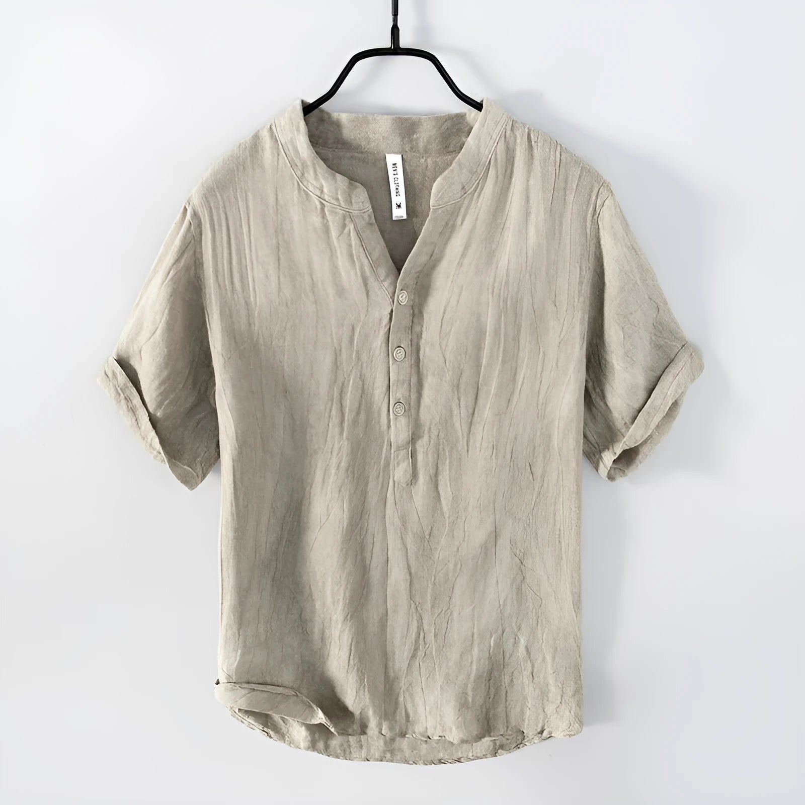 Linen pullover top in solid colour with short sleeves on hanger
