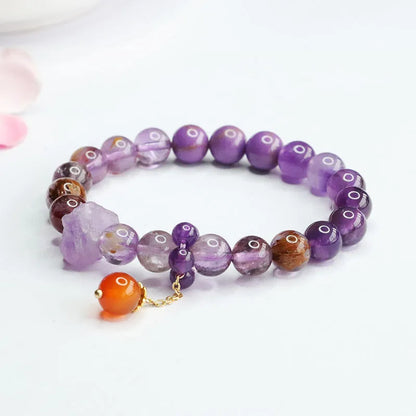 Nine purple crystal bracelet with Amethyst beads and red agate stones in Mori style design