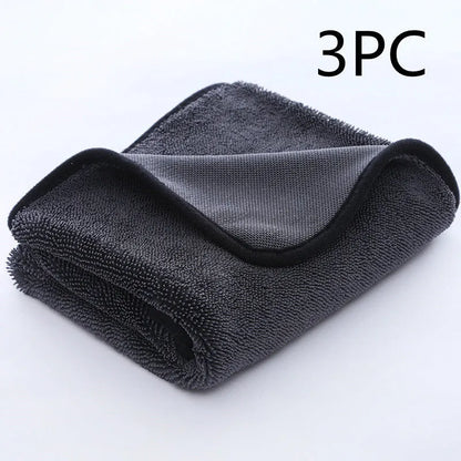 Grey car wash towel with black hemmed edge shown in multiple size options for vehicle cleaning