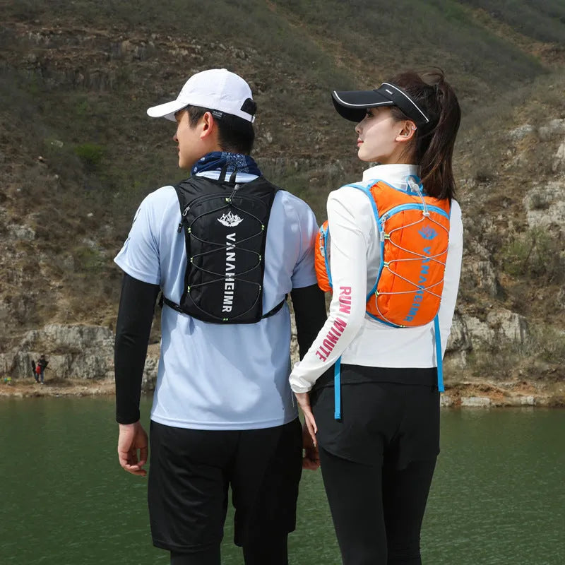 Ultra-light waterproof outdoor backpack in streamer orange colour with air pillow belt system