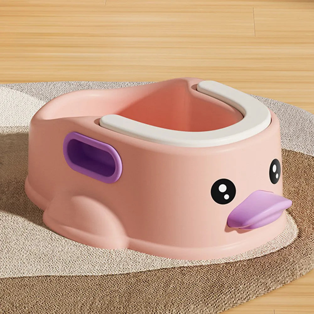 Blue PVC duck-shaped bathtub for washing a small dog, shown on a tiled floor.