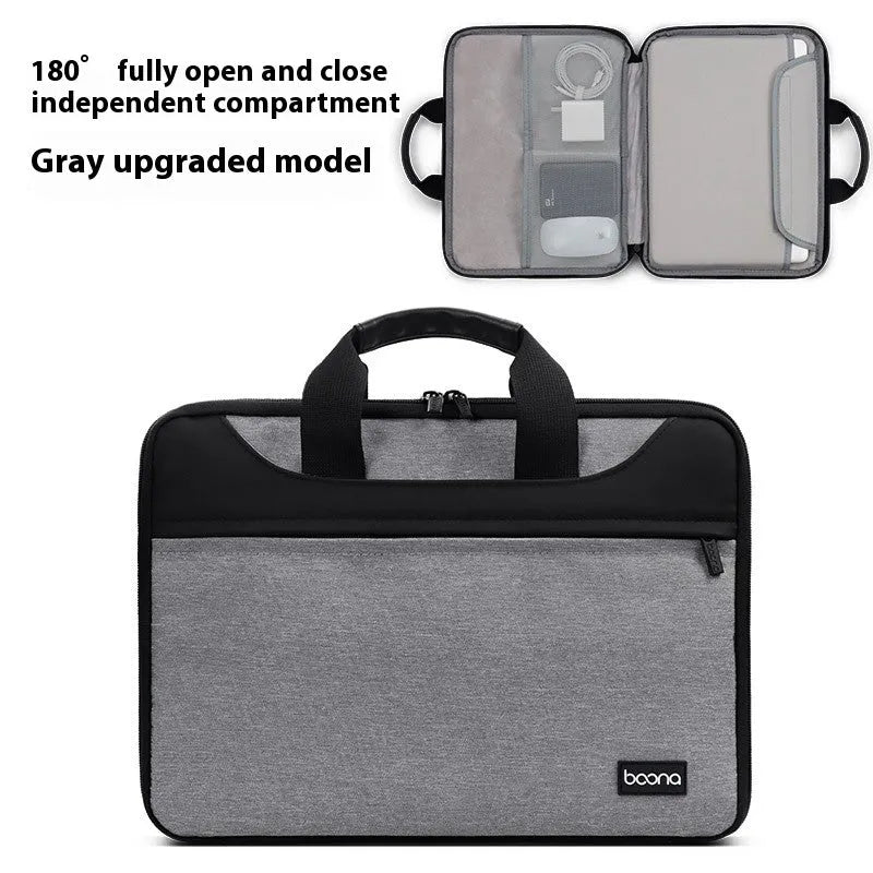 Black Oxford cloth laptop bag fully opened showing main compartment, with soft carry handle.
