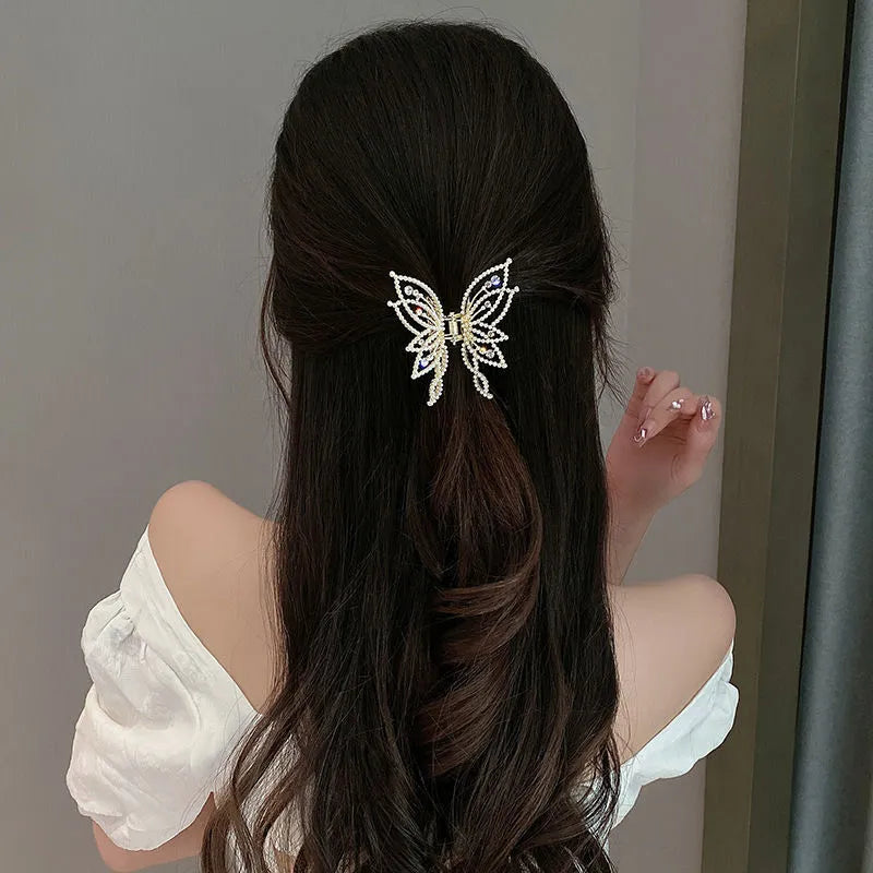 Butterfly hair clip for women with alloy construction and rhinestone or pearl decoration