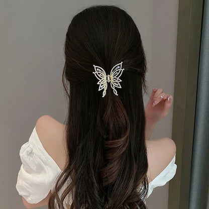 Butterfly hair clip for women with alloy construction and rhinestone or pearl decoration