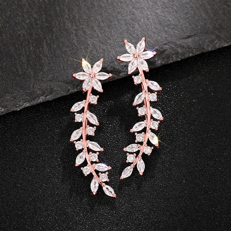 Exquisite diamond flower earrings for women in white gold, gold, and rose gold finishes