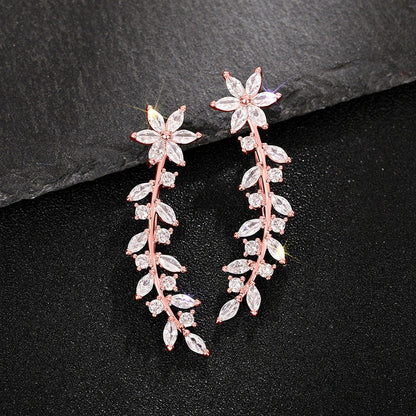 Exquisite diamond flower earrings for women in white gold, gold, and rose gold finishes