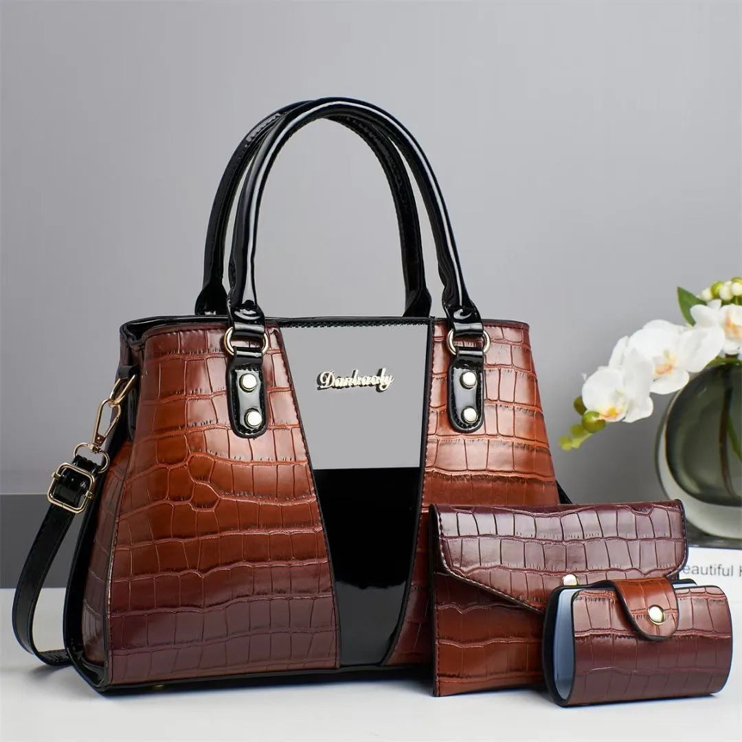 Women's three-piece crocodile stitch shoulder bag set in PU leather, showing main bag, small bag, and card holder.