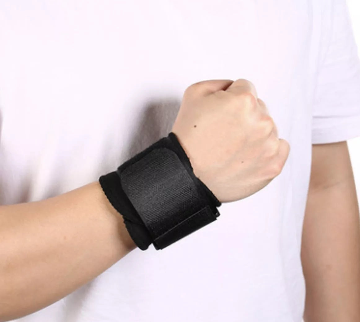Black wrap-around wrist compression strap for sports support