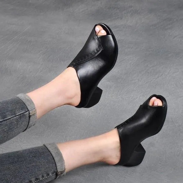 Women's black square heel peep-toe slippers with a rubber sole and fish mouth scaffold design.