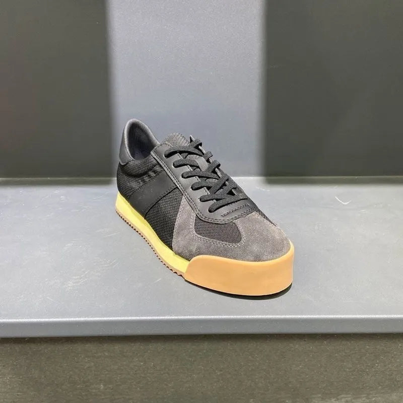 Men's black cow suede and mesh summer sports shoe with mid-heel and herringbone toe pattern on a white background.