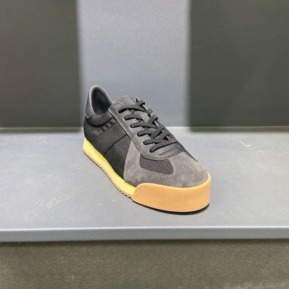 Men's black cow suede and mesh summer sports shoe with mid-heel and herringbone toe pattern on a white background.