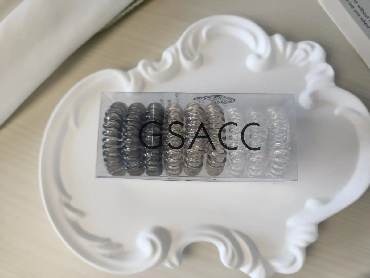 Set of 9 TPU traceless hairbands in various colours for phone cable organisation