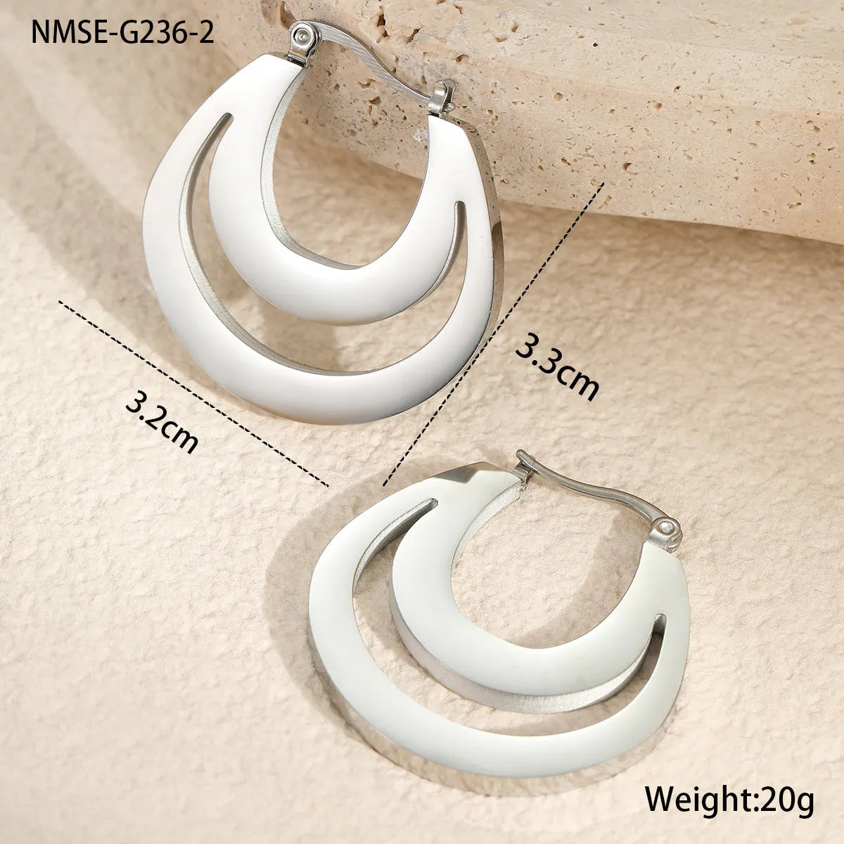 Geometric French earrings with gold plating and round ring design elements