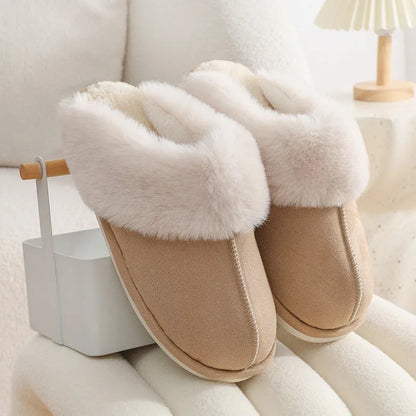 Women's plush winter slippers with round toe, flat heel, and stitching detail on a non-slip PVC sole.