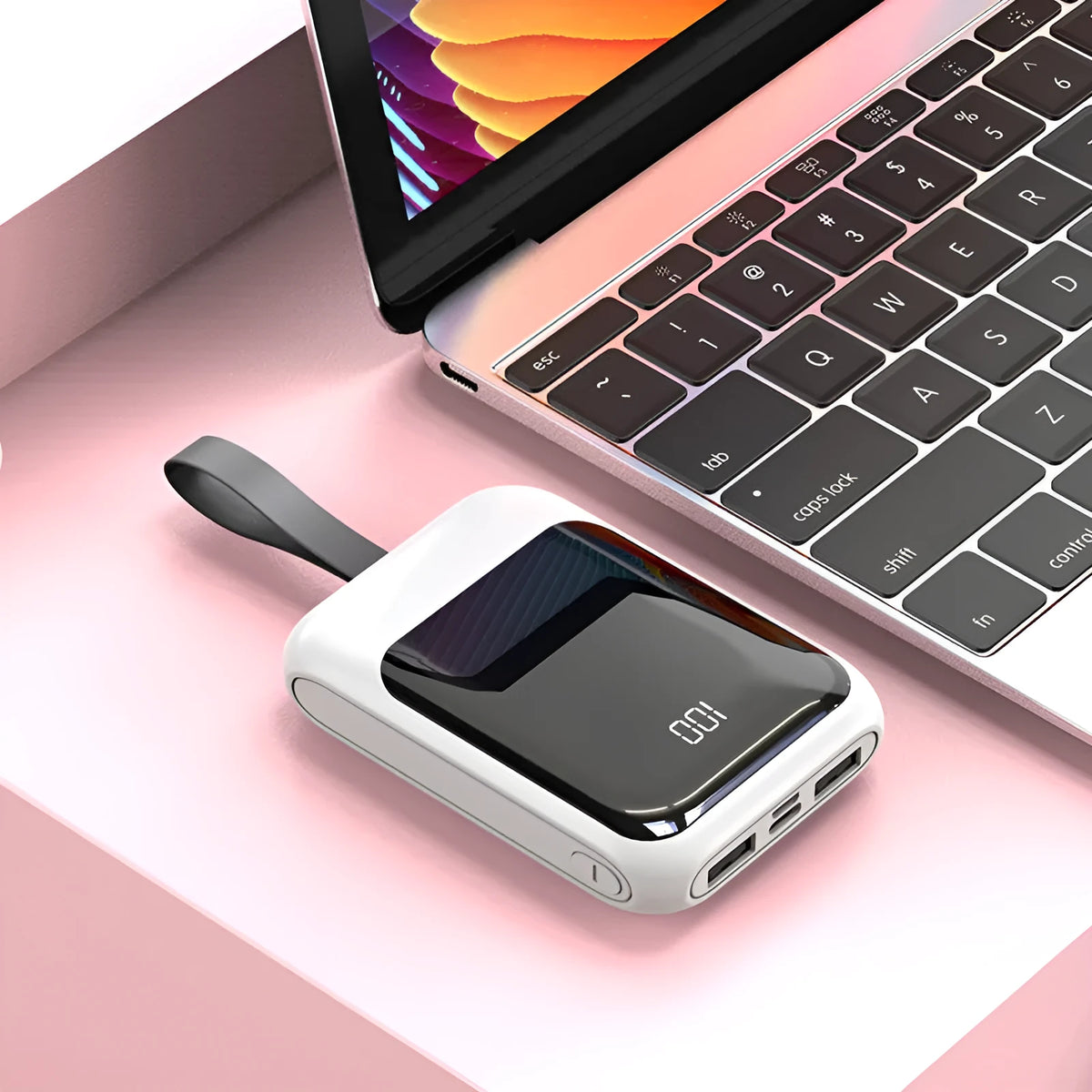 White portable power bank with 20000mAh capacity and multiple USB output ports on a table.